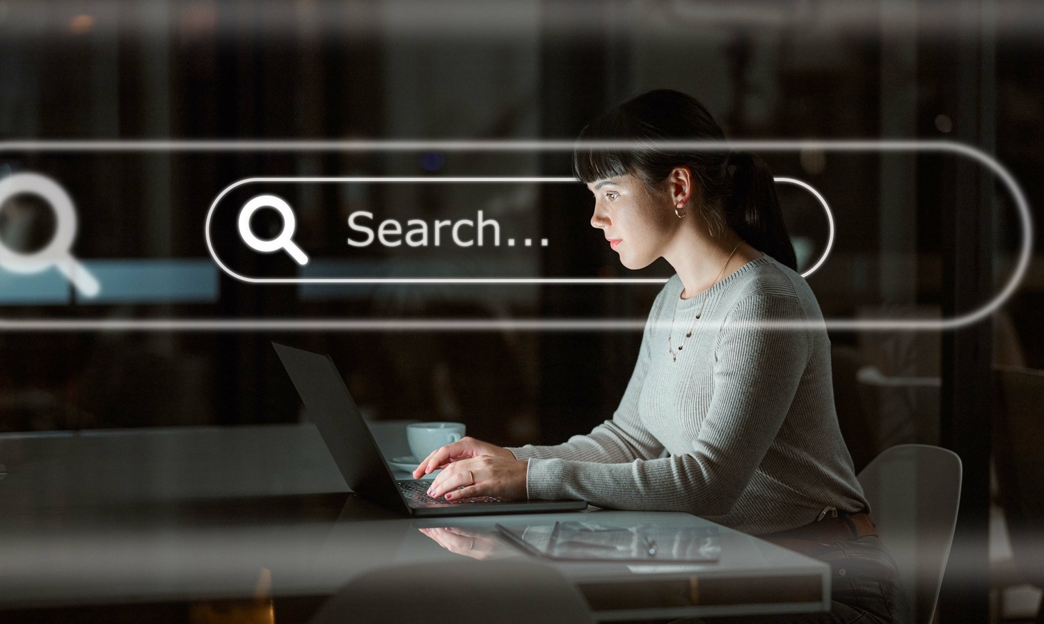 Woman searching on her computer.